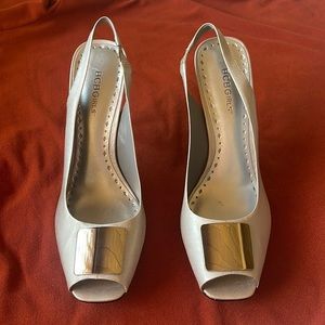 BCB Girls dress 4 1/2” silver color leather heels. Never worn